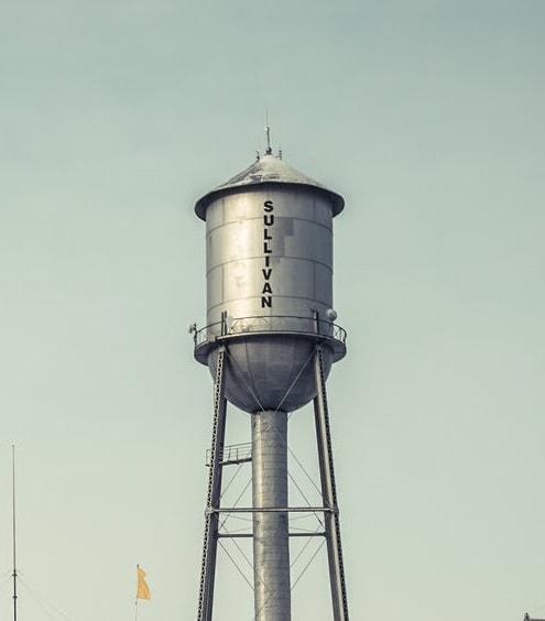 A water tower perched high in the air.